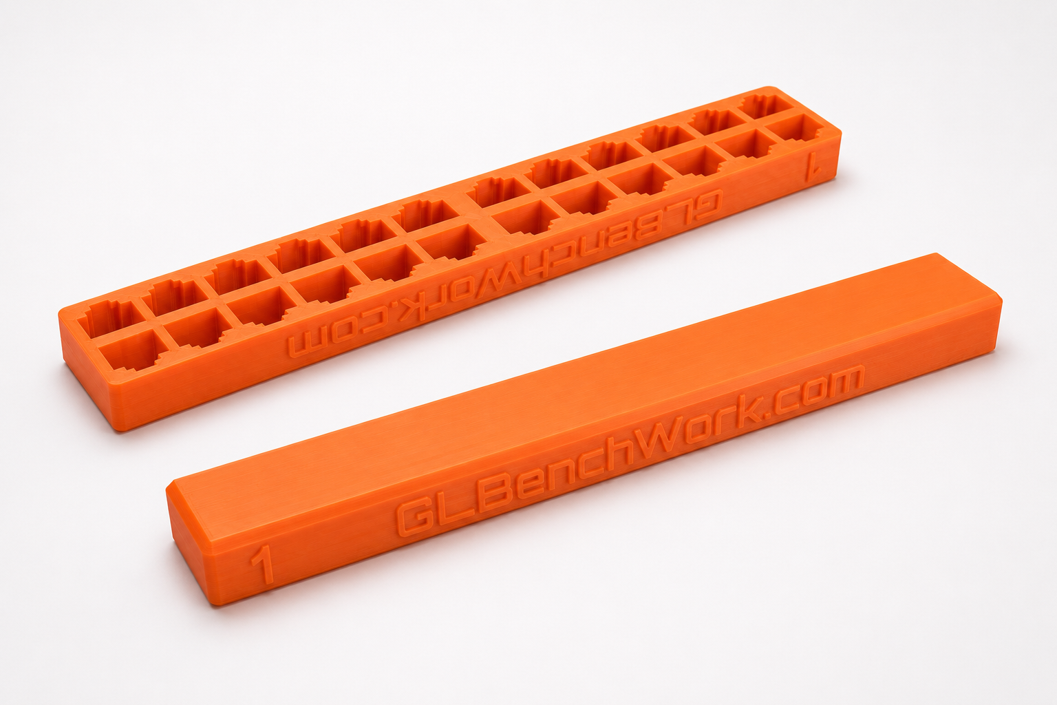 Orange Great Lakes BenchWork RJ45 cable block for organizing patch cords